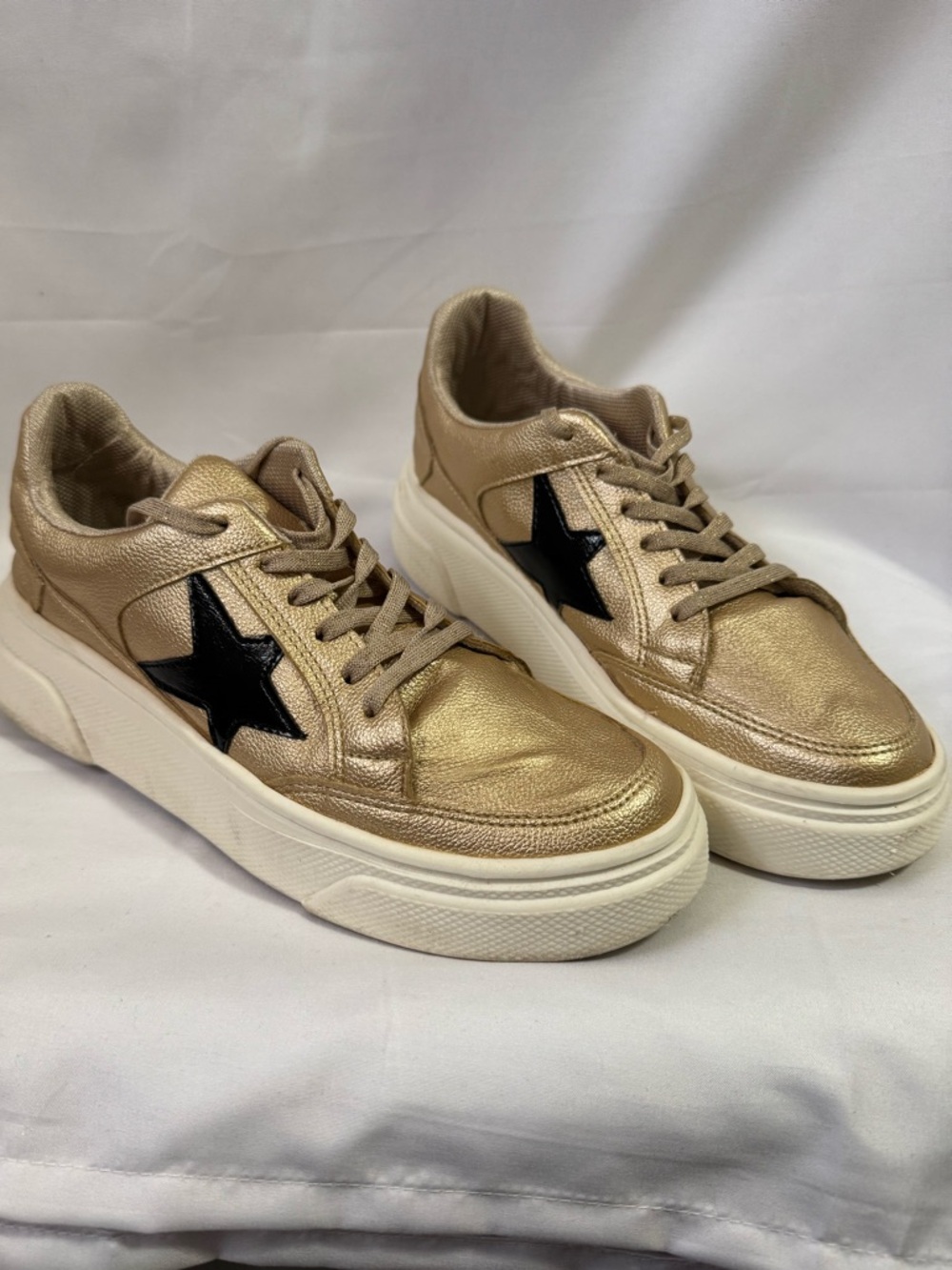Metallic Gold Lace-Up Platform Sneakers with Black Star Accent